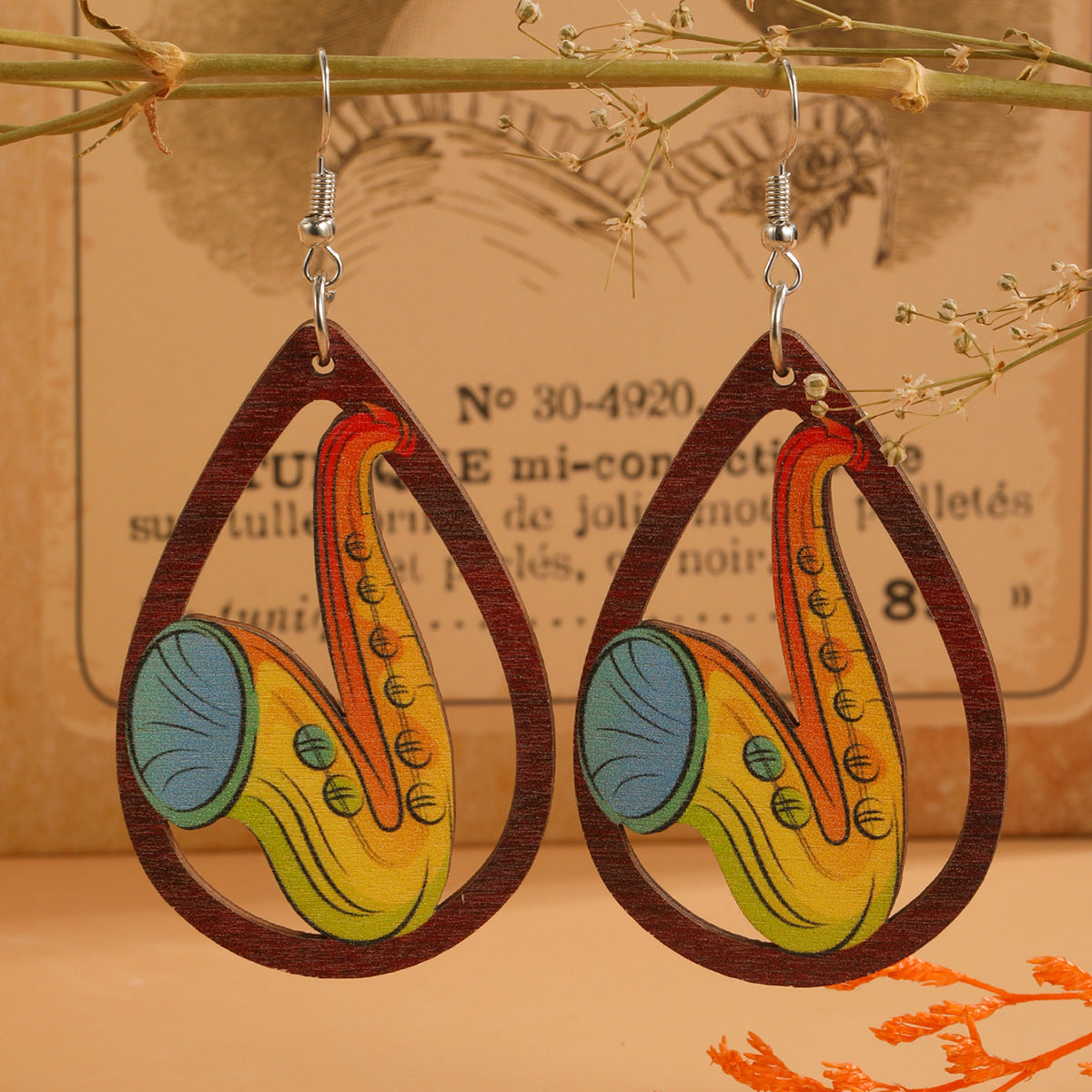 Guitarra de agua de agua al por mayor arpa acordeón estampado de madera aretes de madera